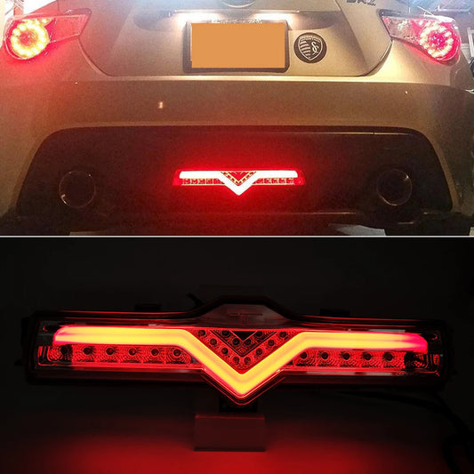 LED rear fog reflector light installed on the rear bumper of a Subaru BRZ