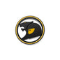 Black round 3D metal badge with yellow ring and yellow accent, stylised big cat design on a white background