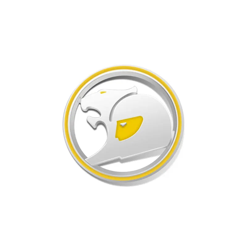 Silver round 3D metal badge with yellow ring and yellow accent, stylised big cat design on a white background