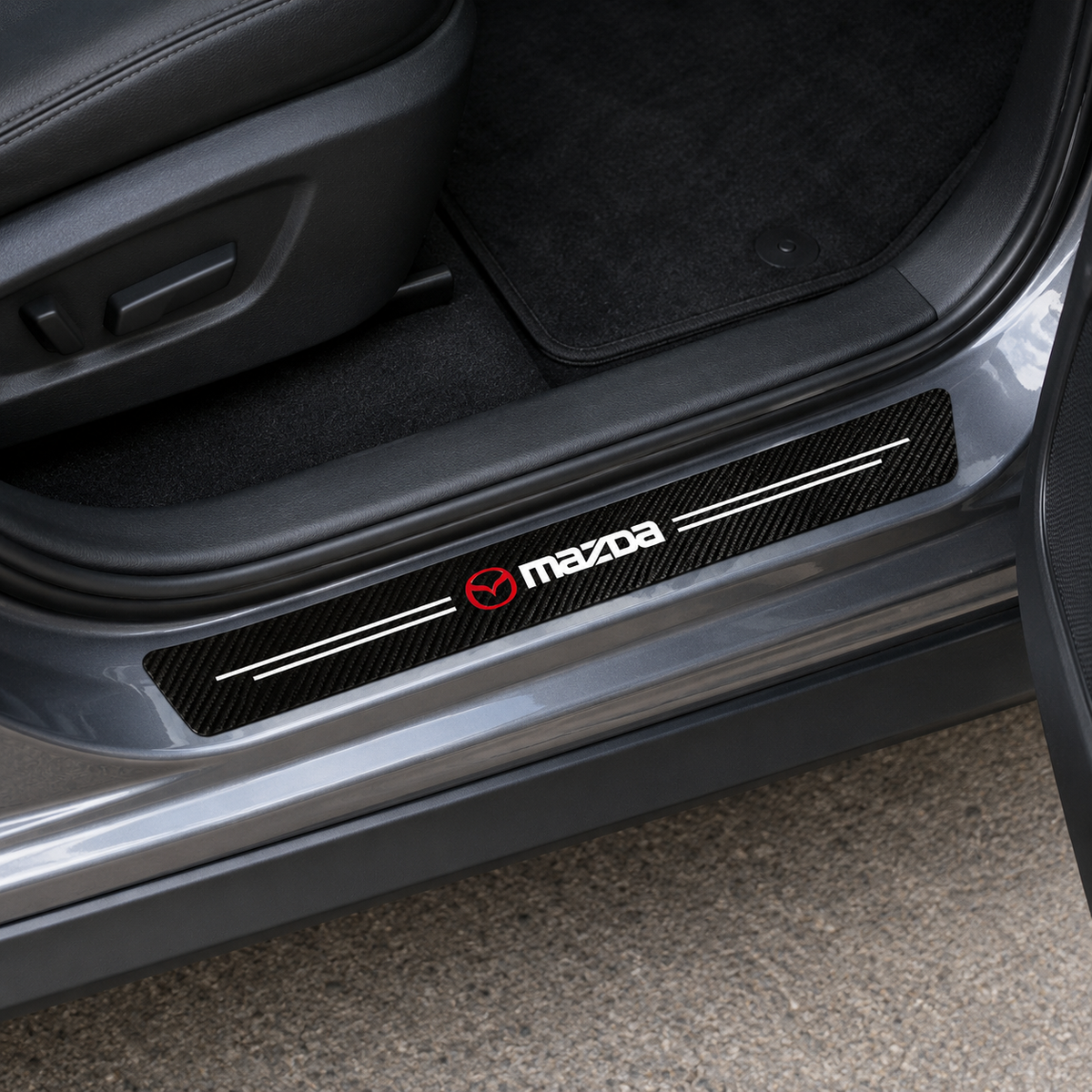 Mazda 5-piece sill protector sticker set laid flat, labelled 2 front door, 2 rear door and 1 trunk piece
