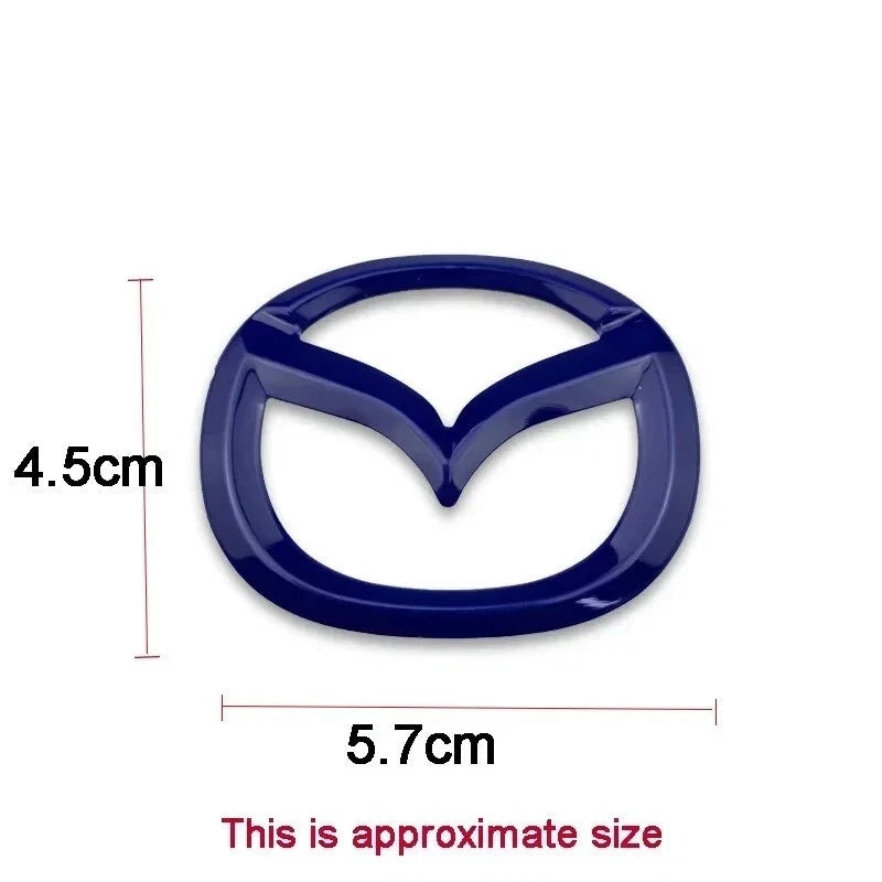 Mazda steering wheel emblem dimensions 4.5 cm by 5.7 cm